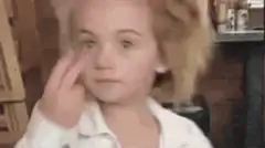 JoJo Siwa crying and wiping tears