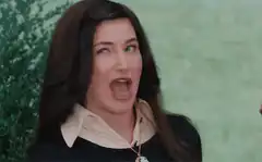 Kathryn Hahn winking and screaming