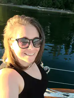 woman in sunglasses on boat