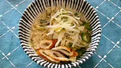 Bowl of ramen with chicken and vegetables