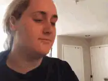 Woman drinks and reacts with disgust