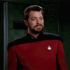 Commander Riker smirking