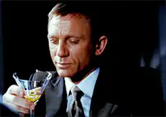 James Bond examining his martini