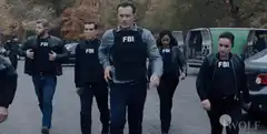 FBI agents walking forward