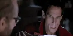 Dracula and Van Helsing stare at each other