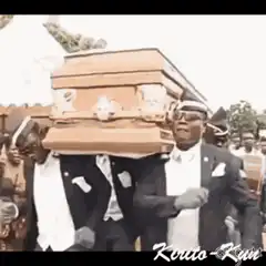 Men dancing while carrying a coffin