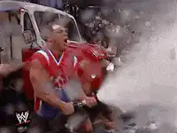 Bret Hart gets sprayed with water