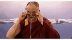 Dalai Lama and stock market graph