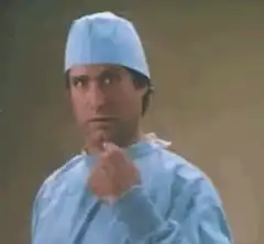 Dr. Cox looks around suspiciously