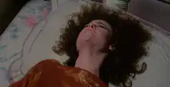 Sigourney Weaver screaming in bed