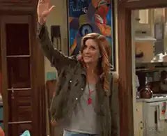 Tate McRae waving and dancing