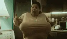 Woman dancing in kitchen