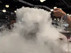 Dry ice smoke billowing over table