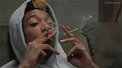 Wiz Khalifa smoking a joint
