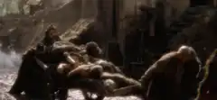 Medieval peasants loading bodies onto a cart