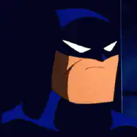 Batman smirks in the dark