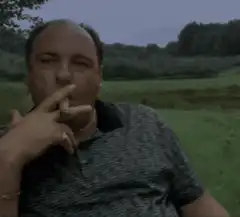 James Gandolfini smoking a cigar