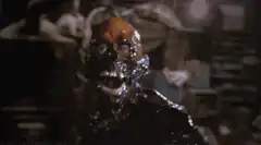 The Blob monster attacks a man