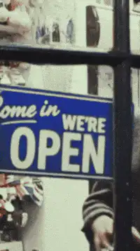 Flip open to closed sign