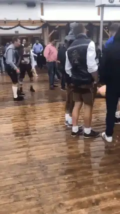 Naked person sliding on wet dance floor