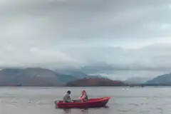 Two people in a boat get struck by lightning
