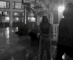 couple kissing in the rain