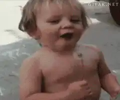 Toddler blows dandelion and cries