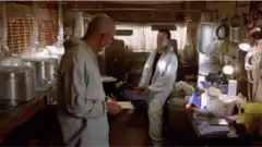 Walter and Jesse laugh in the lab