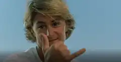 Patrick Swayze shaka sign