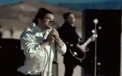 Jack White singing passionately on stage