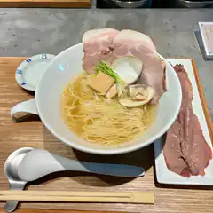 Bowl of ramen with pork and clams