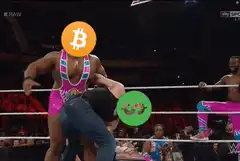 Wrestler with Bitcoin head lifts person with dollar sign head