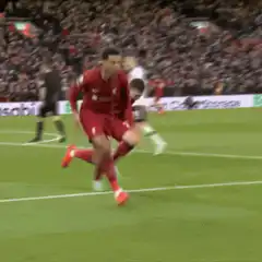 Liverpool player slides on knees then celebrates with teammate