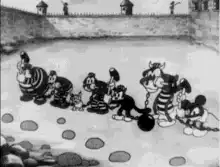 Prisoners with hammers in old cartoon