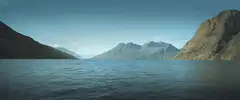 calm lake surrounded by mountains