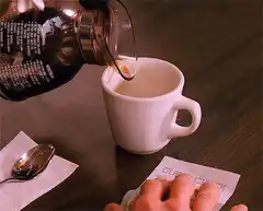 pouring coffee into a mug