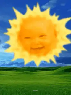 Smiling baby sun over green hills
