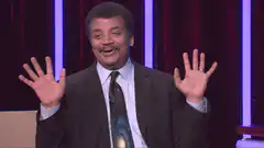 Neil deGrasse Tyson shrugging
