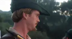 Robin Hood turns and smiles