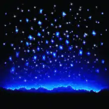 glowing blue stars on dark background