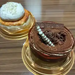 chocolate and coconut desserts on gold plates