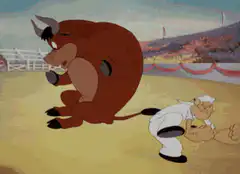Popeye defeats a bull with a punch