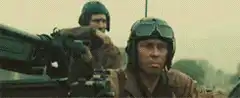 Soldiers in military vehicles
