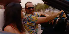 Selena Gomez and Benny Blanco driving in a car