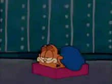 Garfield yawning and going to sleep