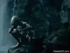 Gollum sitting by waterfall