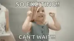 Excited toddler fists pumping