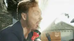 Conan O'Brien gets sprayed with water