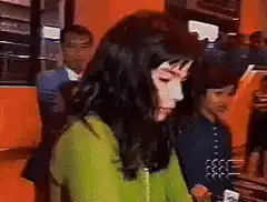 Woman slaps cameraman and knocks him over