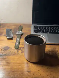 coffee cup on wooden desk